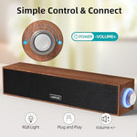 Uakinat multimedia computer soundbar showing close up detail of the dual integrated cords for power and thirty five millimeter sound input.