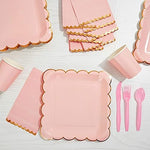 Close up of 3-ply pink paper napkins with metallic gold trim
