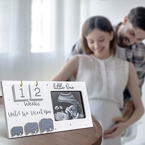 Jwitao baby announcement frame showing the detachable wooden elephant piece used for birth details.