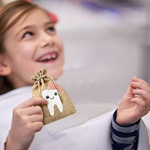 Shappy tooth fairy bag next to a small gift