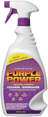 Back view of Purple Power heavy duty degreaser bottle highlighting usage instructions and surface safety warnings.