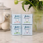 Single count of the rose essential oil infused wool dryer ball used for reducing laundry static.