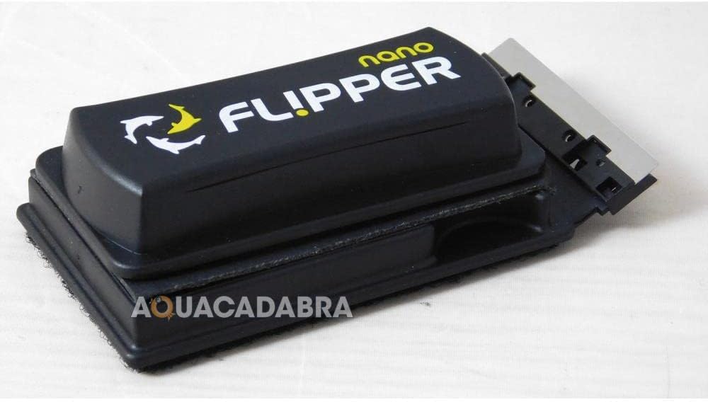 Flipper cleaning tool positioned on a small glass aquarium wall