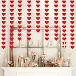 Creative home decor inspiration displaying the red hearts garland draped across a window frame