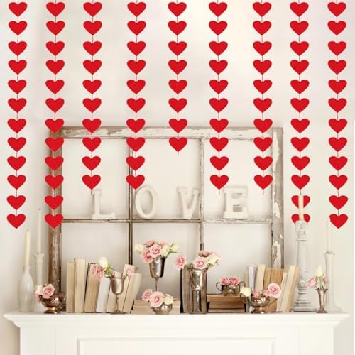 Creative home decor inspiration displaying the red hearts garland draped across a window frame