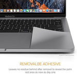 UPPERCASE model A2141 accessories kit highlighting precision cut edges next to the laptop trackpad