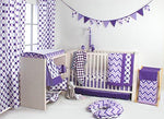 Purple and white polka dot patterned cotton baby blanket and playmat fabric texture detail