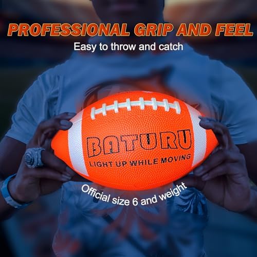 Complete BATURU product kit containing the orange football, hand pump, inflation needle, and batteries.