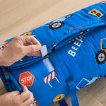 DJY travel nap mat spread open illustrating the water polka dot inner lining fabric.