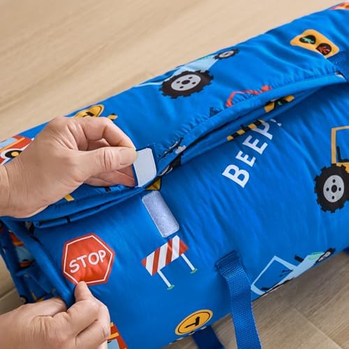 DJY travel nap mat spread open illustrating the water polka dot inner lining fabric.