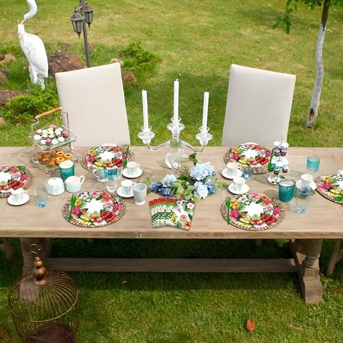 Top down view of tropical luau party plates and green forks