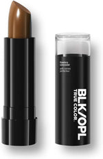 Black Opal concealer stick open showing the high-pigment color core