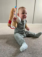 Side view highlighting the non toxic premium fabric stitching of the baby baseball toy.