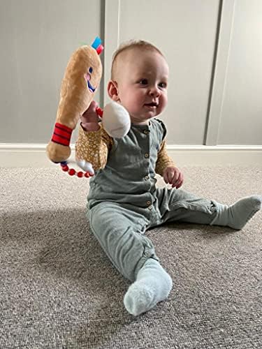 Side view highlighting the non toxic premium fabric stitching of the baby baseball toy.