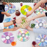 Stack of 90s music theme disposable plates for baby shower