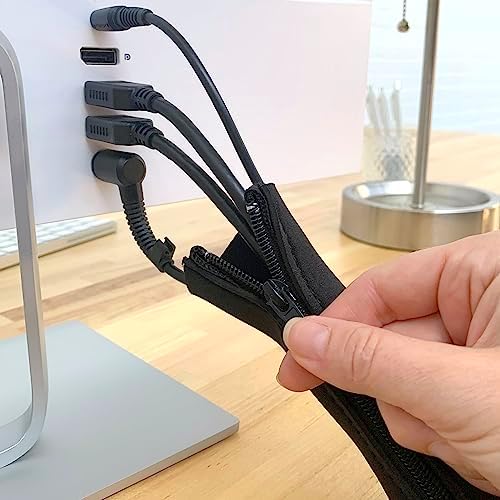 Television cord management sleeve hiding multiple power extension cables