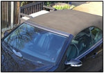 Before and after comparison of a treated ragtop showing enhanced weather protection and moisture resistance.