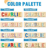 Detailed shot of the multi-line customizable options on the wooden board displaying different name lengths and colors.
