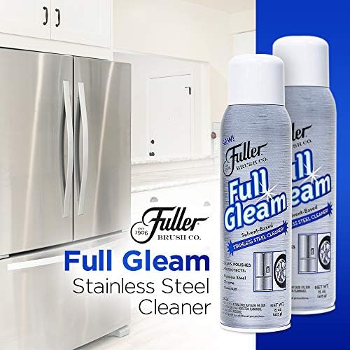Fuller Brush metal conditioning spray being applied to a kitchen sink surface.