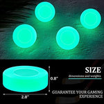 Twenty four pack luminous green floor hockey pucks for night games