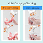 Octuitey double sided toothbrush showing the thick ergonomic rubberized handle grip for wet hands