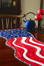 Fiber art book by Karen Eckmeier showing table runner patterns