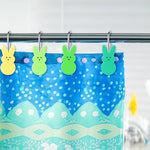 Side profile of the durable resin bunny pendant highlighting the secure attachment to the heavy duty metal hanging loop.