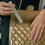 Static Schmatic purse size static cling remover bottle for clothes and hair.