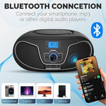 Philips CD player boombox playing music outdoors