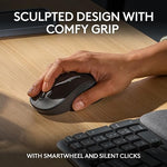 Logitech ergonomic workspace setup showcasing the compact wave keyboard layout.