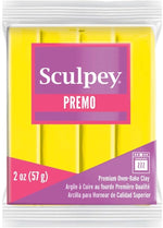 Sculpey liquid clay softener next to polymer clay block