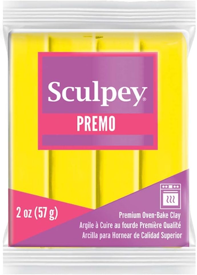 Sculpey liquid clay softener next to polymer clay block