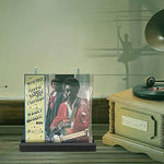 Minimalist black audio accessory stand for vinyl record collectors.