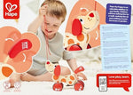 Side angle of the award winning Hape wooden dachshund lover gift toy showcasing the nodding head mechanism