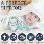 Baby boy Catholic baptism gift set with blue pearl beads displayed next to the open ceramic container