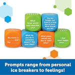 Orange ice breaker conversation cubes showing low pressure questions for children to open up in groups.