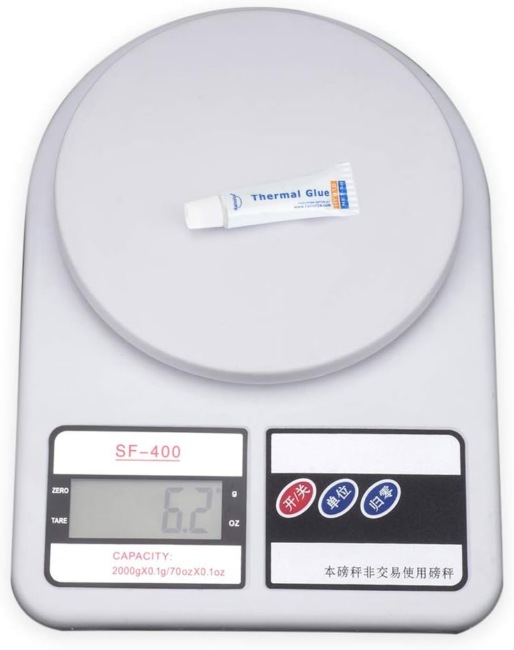 Complete set of three thermal paste tubes in retail packaging