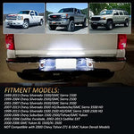 Pair of D-Lumina LED license lights illuminated to show the 6000K white brightness and red safety tube.