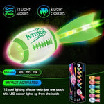 Impact activated LED sports ball glowing brightly during an evening backyard catch