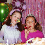 Laser reflective pink metallic tinsel backdrop detail view showing high gloss PET strands