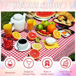 Rectangular party table covered with red and white checkered plastic cloth