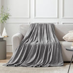 Close up view of the ultra soft fuzzy texture of the Hansleep grey microfiber blanket
