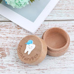 Wooden tooth fairy box for kids sitting on a nightstand