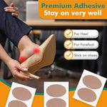 Moleskin adhesive pad applied to the back of a heel for friction reduction.