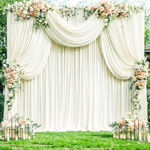 Four panels of ivory drapes installed on a professional photography frame