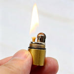 UOOPHEE compact EDC kerosene lighter disassembled showing inner fuel chamber base