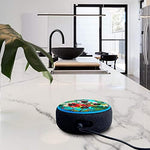 Top down view of Echo Dot 3rd Gen with botanical decal applied
