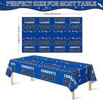 Close up view of Class of 2026 and Congrats Grad print on blue plastic tablecloth