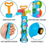 Toddler playing with Liberry plastic golf set in a garden