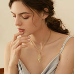 YILUOCD gold hollow map necklace closeup detail